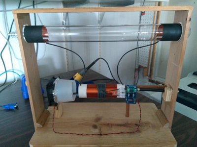 The plasma tube holder with the LC31BAT coupler and cooling fan.