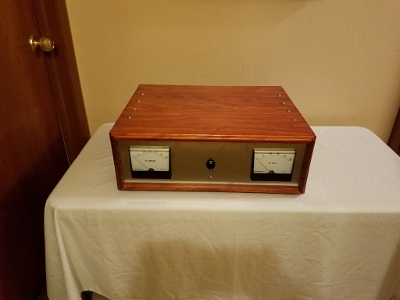 A system installed in a nicely finished wood cabinet.